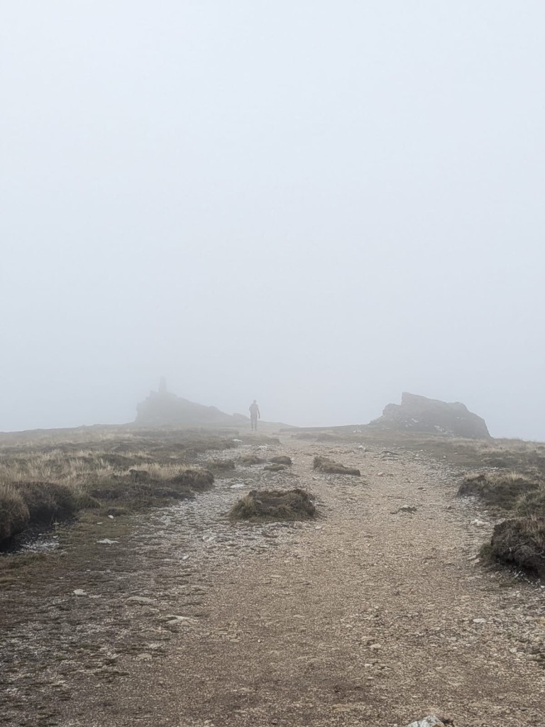 Walking into the mist toward Djouce